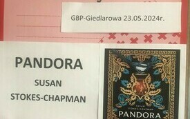 Plakat DKK z okładką książki &quot;Pandora&quot;. 