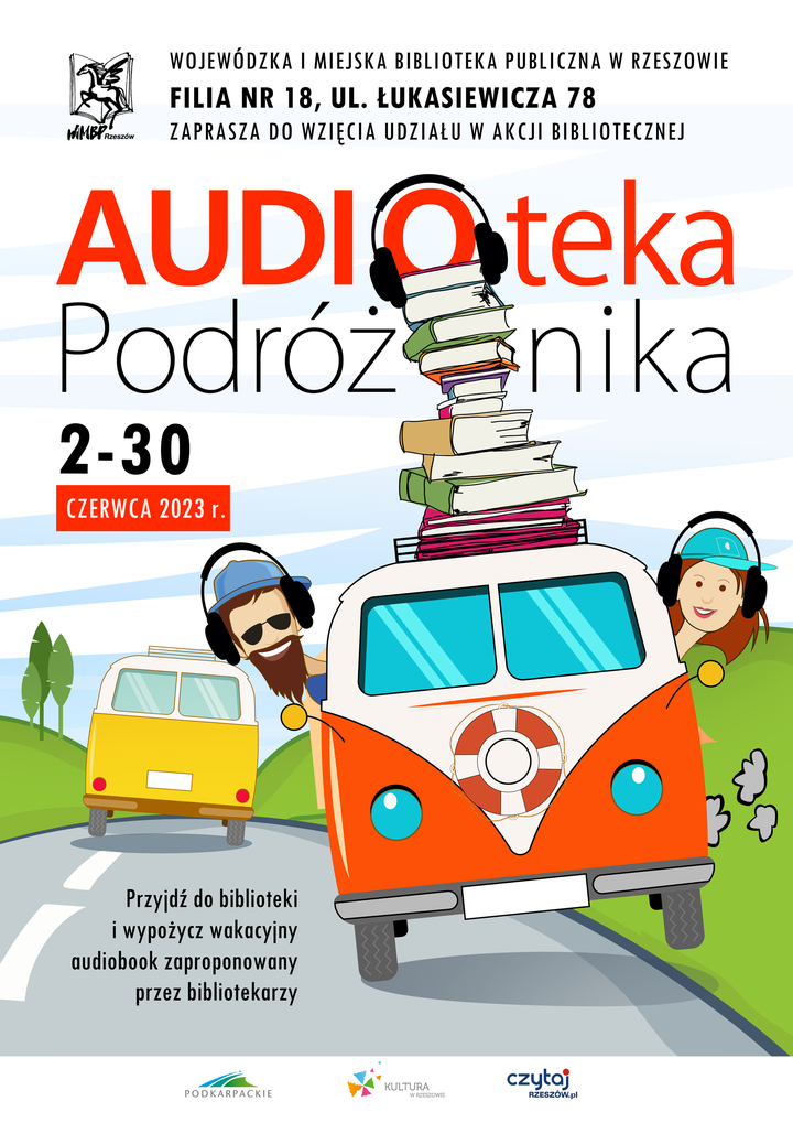 Ulica biegnąca pośród wzgórz. Na ulicy auto z którego wychylają się dwie postacie ze słuchawkami na uszach. 